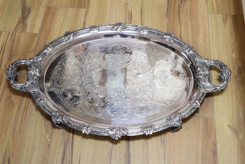 A late Victorian/Edwardian large oval silver-plated twin-handled tray with acanthus border, width 74cm inc. handles